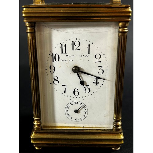 443 - A late 19th century brass carriage clock with eight day striking movement, currently running