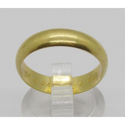 234 - 18ct wedding ring, inscribed to interior, size Q, 4.5g