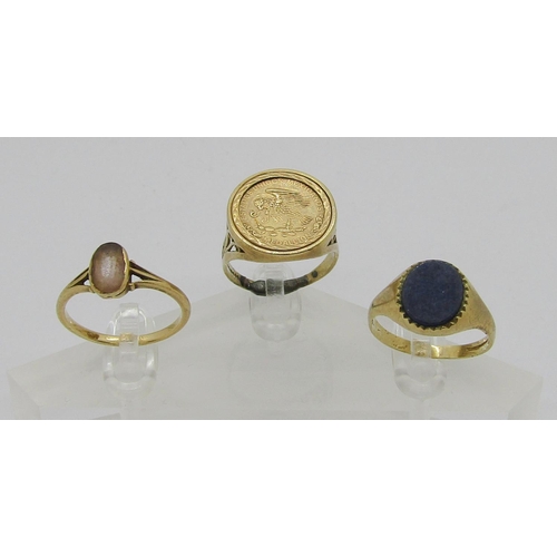 249 - Three 9ct rings; a signet ring set with lapis lazuli, 2.8g, a gem set example, 2.4g and an example s... 