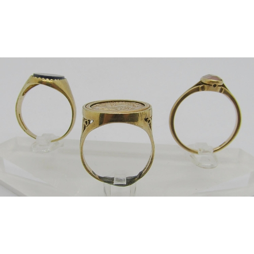 249 - Three 9ct rings; a signet ring set with lapis lazuli, 2.8g, a gem set example, 2.4g and an example s... 