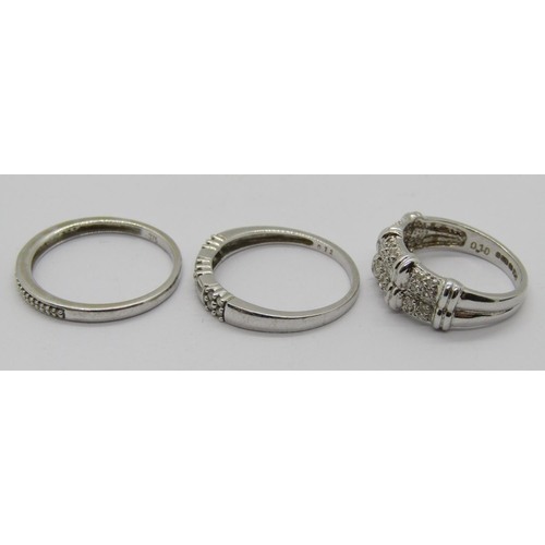 252 - Three contemporary 9ct white gold diamond set half hoop rings of various design, sizes J - P, 6.3g t... 