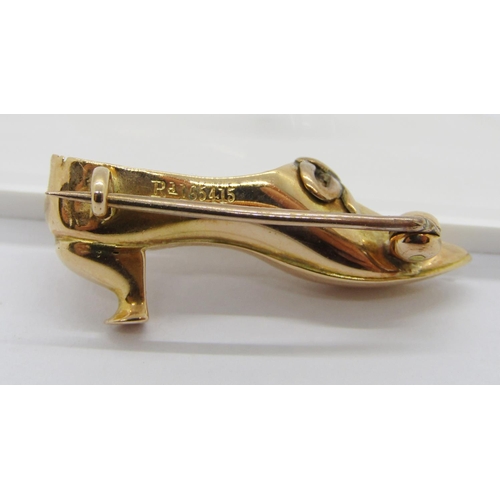 253 - Antique yellow metal brooch in the form of a lady's shoe, registration number 165415, 3.3cm W approx... 