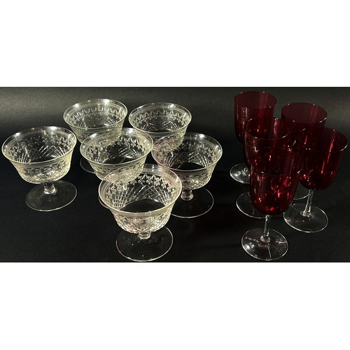 140 - A mixed selection of 19th and 20th century glassware including decanters, jugs, sets of matching gla... 