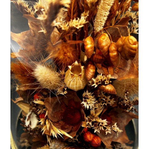 540 - A dried flower arrangement in glass dome display, a pair of porcelain powder tubes, a small magnifyi... 