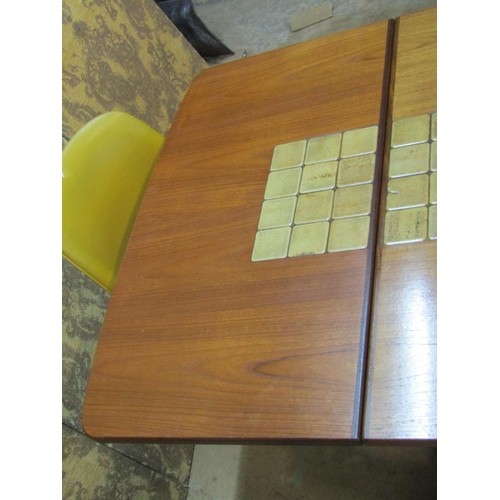 1146 - A mid 20th century G plan teakwood extending drop leaf table , the central section enclosing ceramic... 