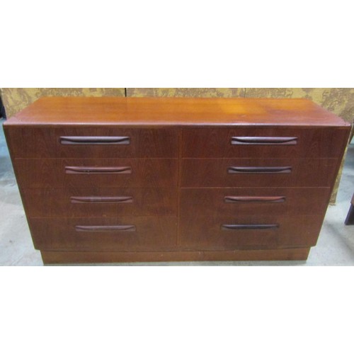 1165 - A G-plan chest of eight drawers in a side by side arrangement 142 cm wide