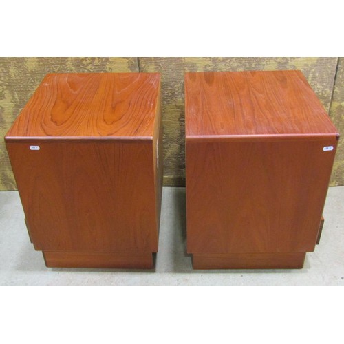 1170 - A pair of G Plan side cabinets each partially enclosed with a frieze drawer