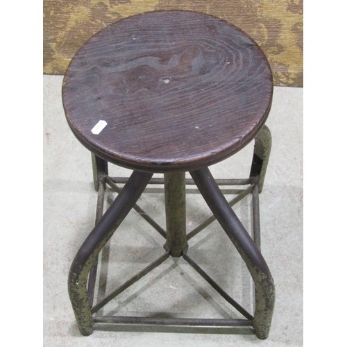 1156 - A vintage industrial swivel stool with steel base and revolving elm seat