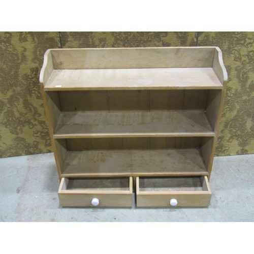 1171 - A 19th century stripped pine wall mounted shelve unit with two drawers, 80 cm wide