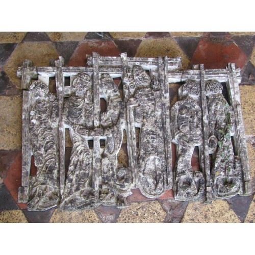 1041 - A weathered cast composition stone wall plaque depicting mediaeval characters (af)