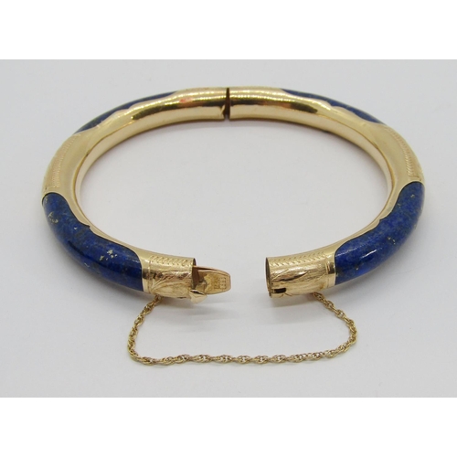 247 - 14k lapis lazuli hinged bangle with engraved detail and heart shaped push clasp, 7cm diameter approx... 