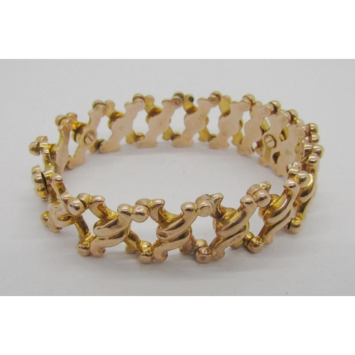 274 - Unusual 9ct fancy X link expanding bracelet, stamped '9 Flexine Patent', 11.4g