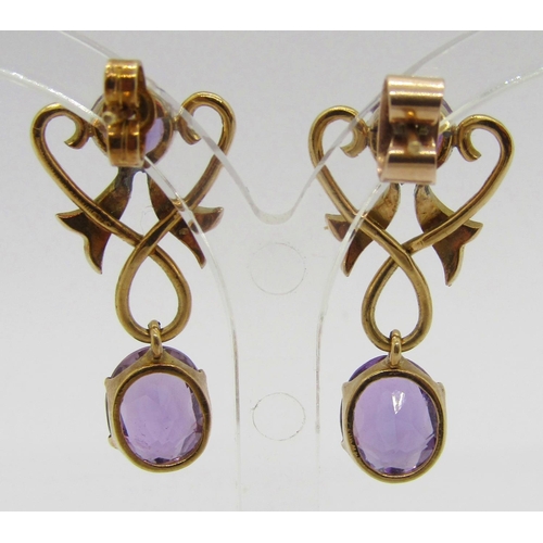 275 - Pair of early 20th century yellow metal amethyst and seed pearl drop earrings in the manner of Murrl... 