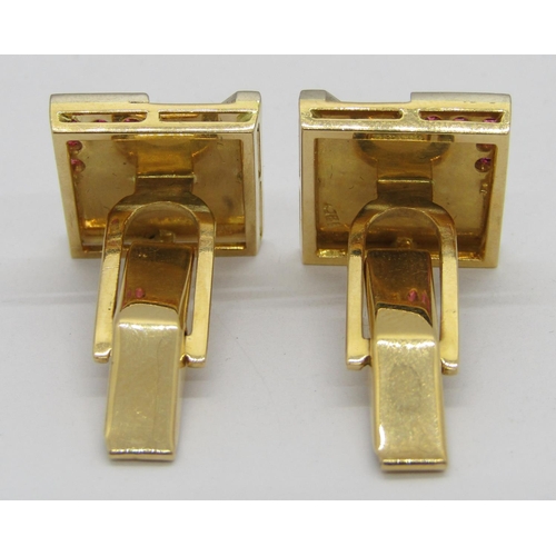 280 - Pair of vintage 18ct ruby set cufflinks of square form with textured finish, 1.5 x 1.5cm approx, 16.... 