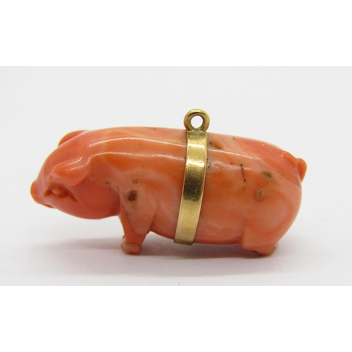 284 - Yellow metal mounted carved coral pig charm, 3cm L approx, 8.4g (back legs af)