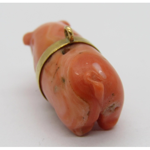 284 - Yellow metal mounted carved coral pig charm, 3cm L approx, 8.4g (back legs af)