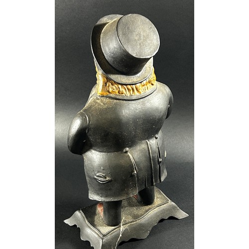 437 - A John Bull Blinking Eye mantle clock made from cast iron, 41cm