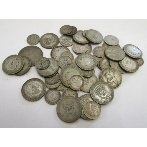 873 - A collection of Victorian silver coinage to include half crowns, florins, shillings, and smaller coi... 