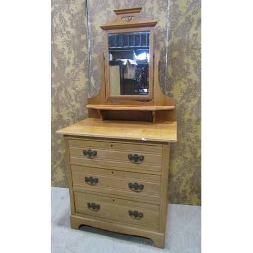 1182 - A late 19th century stripped and waxed satin walnut dressing chest of three long drawers with raised... 