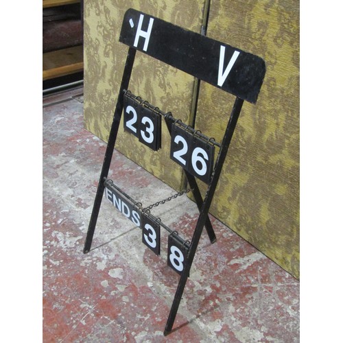 1082 - An over-painted (yellow) milk churn, a vintage swing letter/numerical display and a small shield sha... 