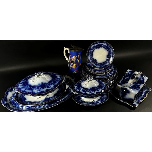 115 - A Pountney's Milton Pattern dinner service for six in a blue and white colourway with art nouveau in... 