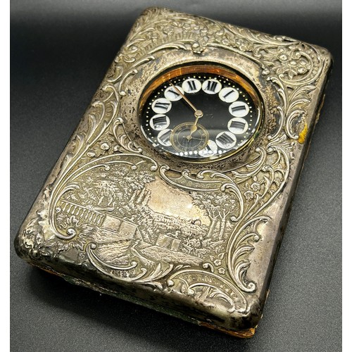 178 - A late Victorian silver watch case with a country house scene and scrolled detail, Birmingham 1899, ... 