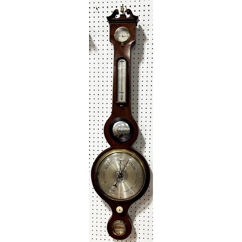 468 - A Georgian mahogany wheel barometer with silvered dials, swan neck pediment by Stowbridge of Dawlish... 