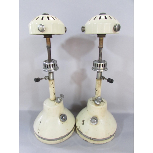 481 - A pair of Bialaddin pressure table lamps Model T.10, an Edwardian mahogany mantel clock inlaid with ... 