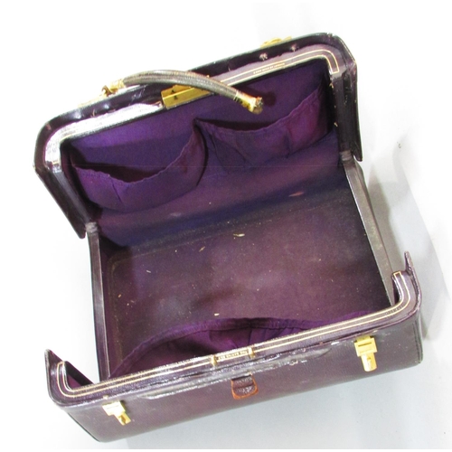 483 - A leather travel box with silver plated jars, Sorrento box, writing slope and Moroccan leather trave... 