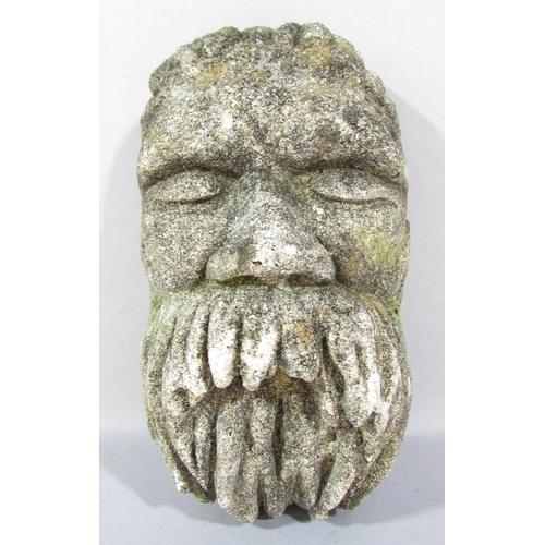 490 - A reconstituted stone cast face of a bearded man, 27cm x 15cm