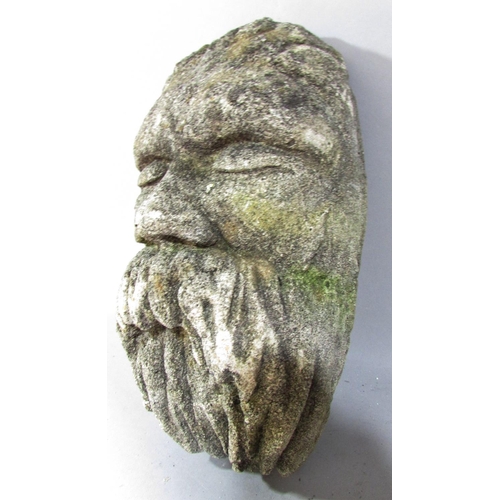 490 - A reconstituted stone cast face of a bearded man, 27cm x 15cm