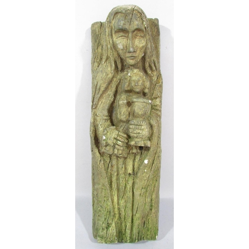 491 - A simulated oak carving, in plaster, a figure of the Virgin Mary holding Baby Jesus, 40cm x 13cm.