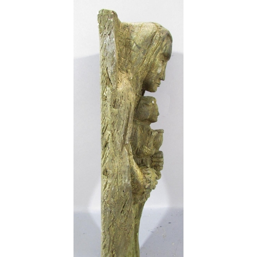 491 - A simulated oak carving, in plaster, a figure of the Virgin Mary holding Baby Jesus, 40cm x 13cm.