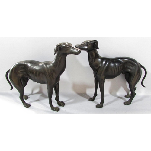 492 - A pair of cast bronze greyhounds, 29cm x 36cm approx.