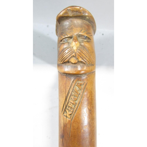 497 - A walking stick with a carved head of a bridled horse handle, with an indistinct stamp, 83cm.