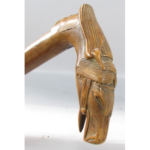 497 - A walking stick with a carved head of a bridled horse handle, with an indistinct stamp, 83cm.