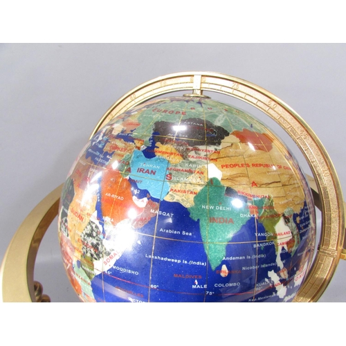 506 - An ICYY Co. Gemstone Globe, with countries picked out in various semi-precious stone, set on a brass... 