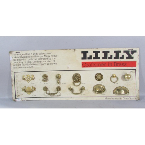 510 - A Lilly Craftsman In Brass samples board of period style brass drawer handles.