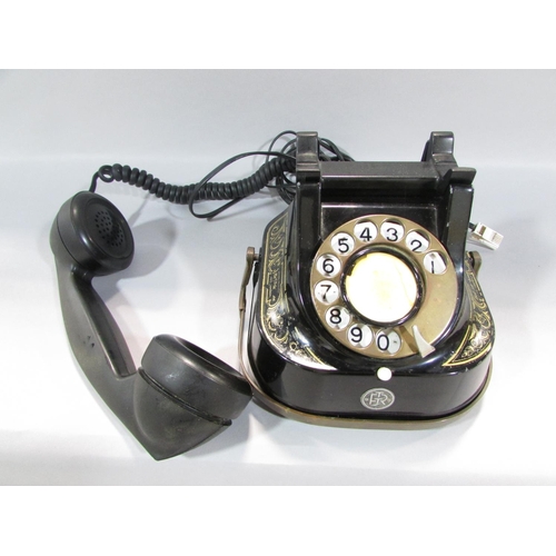 515 - A Vintage Belgian telephone with conversion lead, an electronic illuminating magnifying glass and a ... 