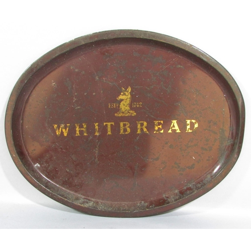 522 - A pair of Whitbread metal trays, a pair Whitbread match strikers, Martel Brandy Mug etc