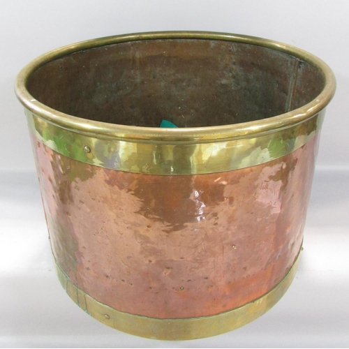 524 - A 19th century copper and brass banded barrel coal bucket, 45cm diam x 33cm high.