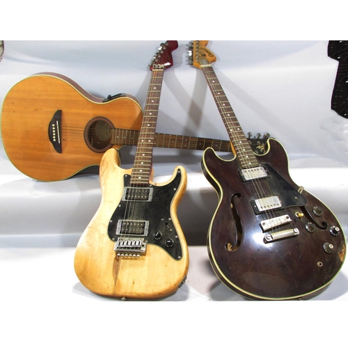 528 - A Yamaha six string Spanish acoustic guitar, a Columbus electric guitar and a Tokai Super Edition el... 