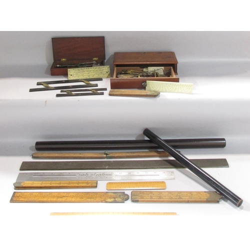 533 - A selection of vintage rulers, rollers, and weighing scales.