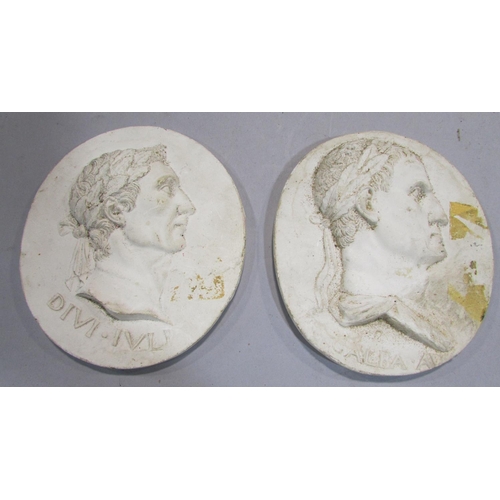 535 - Four grand tour style oval plaster classical profile portraits of Roman dignitaries, after the antiq... 