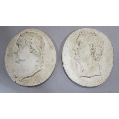 535 - Four grand tour style oval plaster classical profile portraits of Roman dignitaries, after the antiq... 