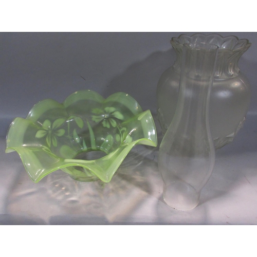 547 - Two 19th century oil lamp bases, a pressed glass shade, a chimney and a Vaseline glass floral decora... 