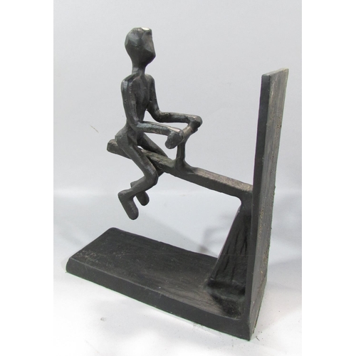 548 - A pair of novelty wrought iron see-saw book ends.