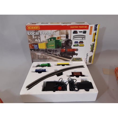 1735 - A large collection of mainly Hornby 00 gauge railway models including Local Freight box set R1085, d... 