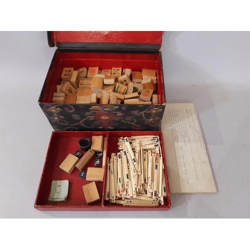 1737 - A large collection of traditional vintage toys and games including a Mahjong set in card box, a leat... 