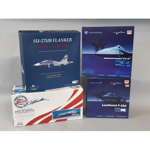 1748 - 4 boxed models  of aircraft and a jet car comprising 1:72 scale SU-27UB Flanker Russia Airforce 58, ... 